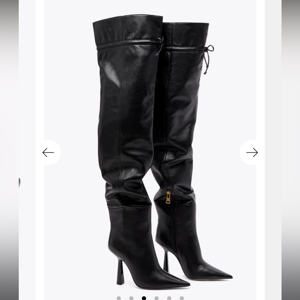 Thigh high , high heel boots still in box brand new.